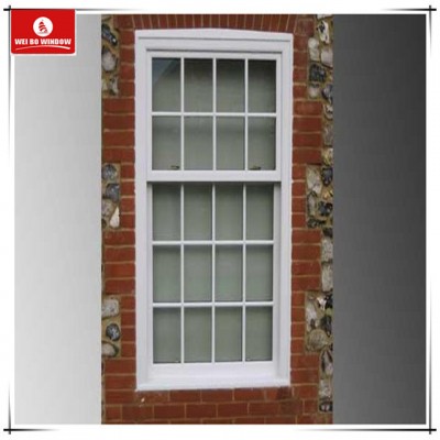 UPVC vertical sliding casement window with surface mounted Georgian Bars